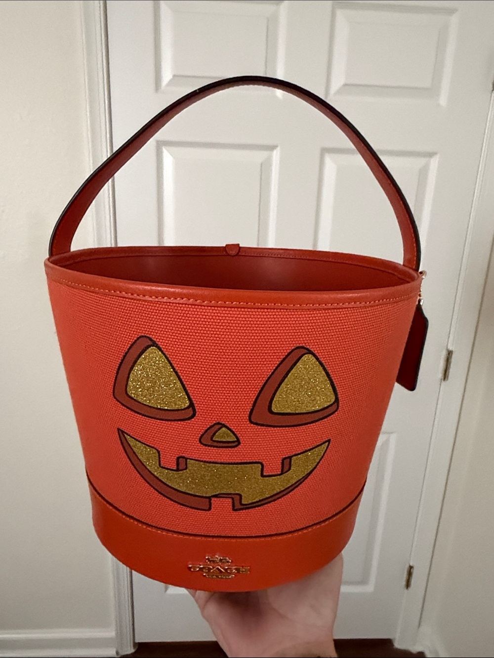 Coach Orange Jack-O'-Lantern Glitter Bucket Tote